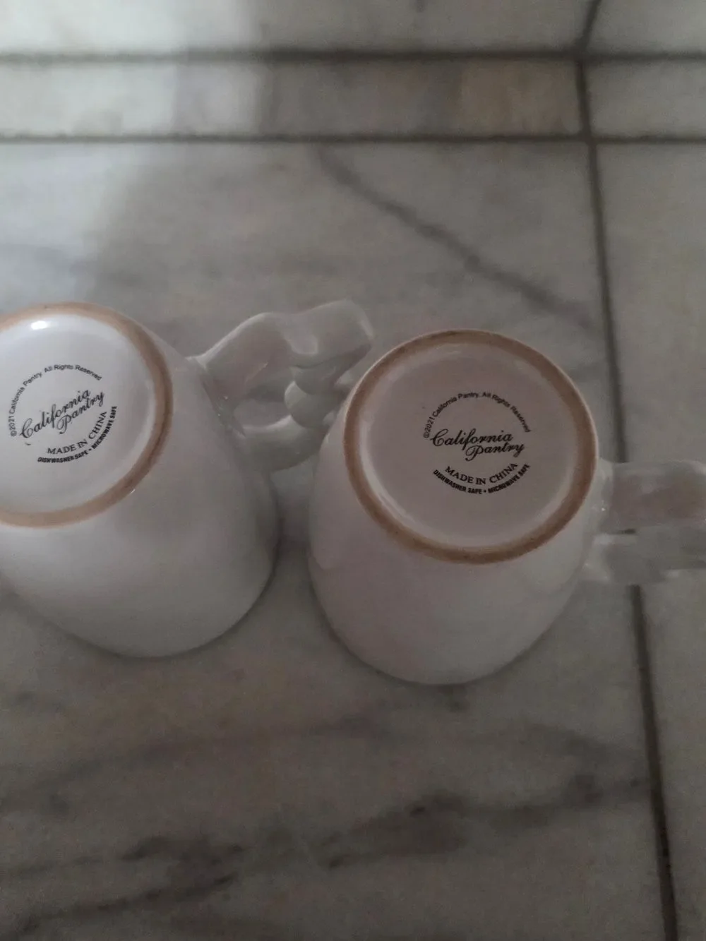 Festive White Ceramic Mugs with Red Interior and Reindeer Print, Set Of 2